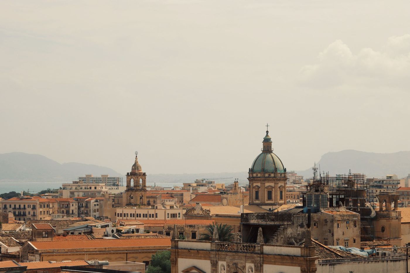 A view over the rooftops of Palermo to the cathedral dome, Sicily